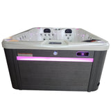 Spa Jacuzzi Wallis avec habillage Gris et Led éclairée en rose