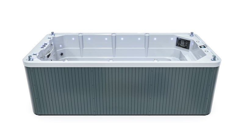 Vue de profil du Spa de nage FIGARI de la marque ZigZag SPA avec habillage GRIS